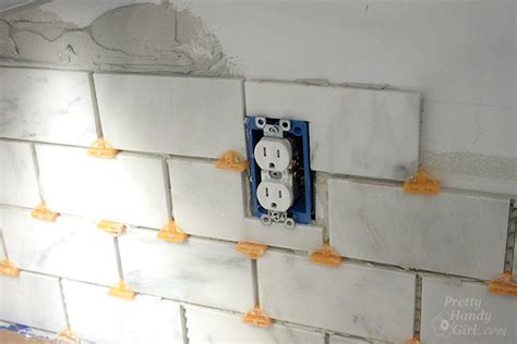 electrical box thru celiing tile|How to Tile Around Outlets: 15 Steps (with Pictures).